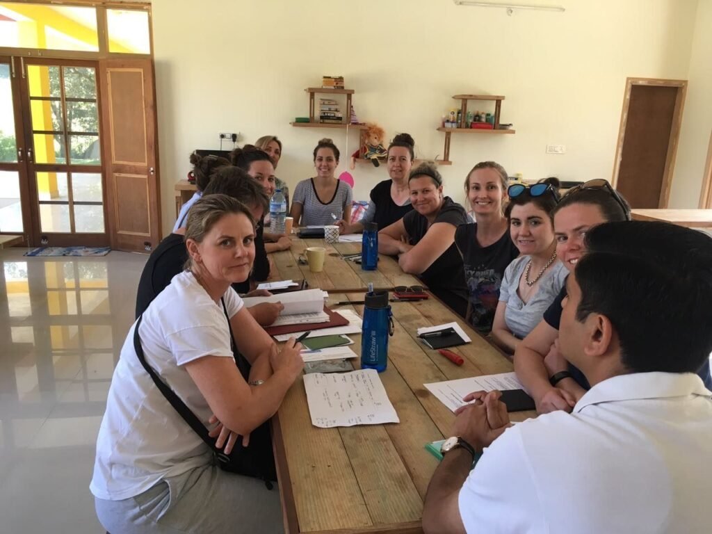 New volunteers at an orientation session with our coordinator in Delhi